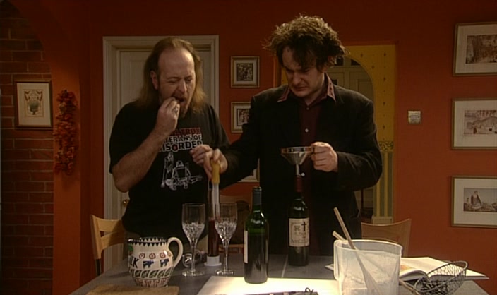 I'M CHEWING THE CORK TO GET IT BACK IN THE BOTTLE. 