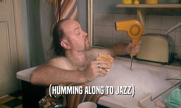 (HUMMING ALONG TO JAZZ)  