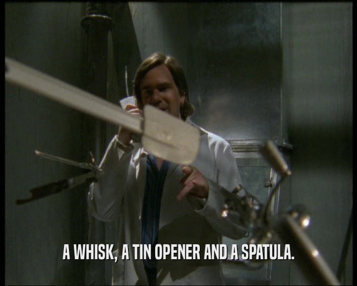 A WHISK, A TIN OPENER AND A SPATULA.
  