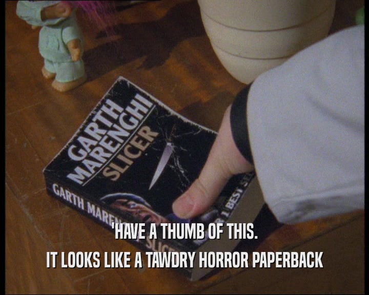'HAVE A THUMB OF THIS. IT LOOKS LIKE A TAWDRY HORROR PAPERBACK 