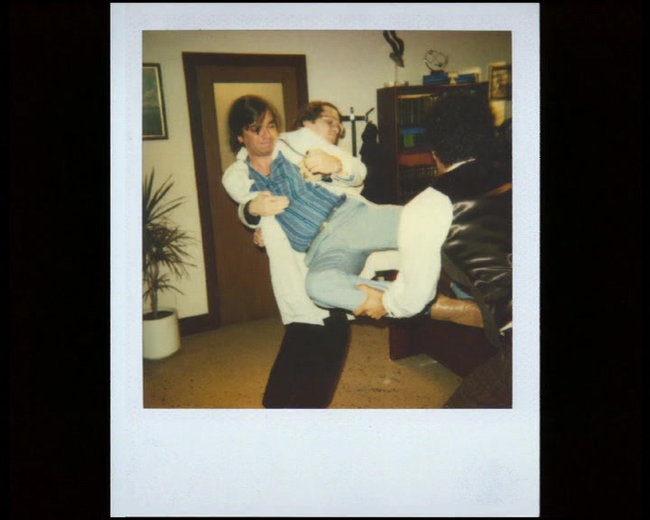 (GARTH) 'SANCHEZ LUNGES AT REED BUT IS HELD DOWN BY DAGLESS.' 