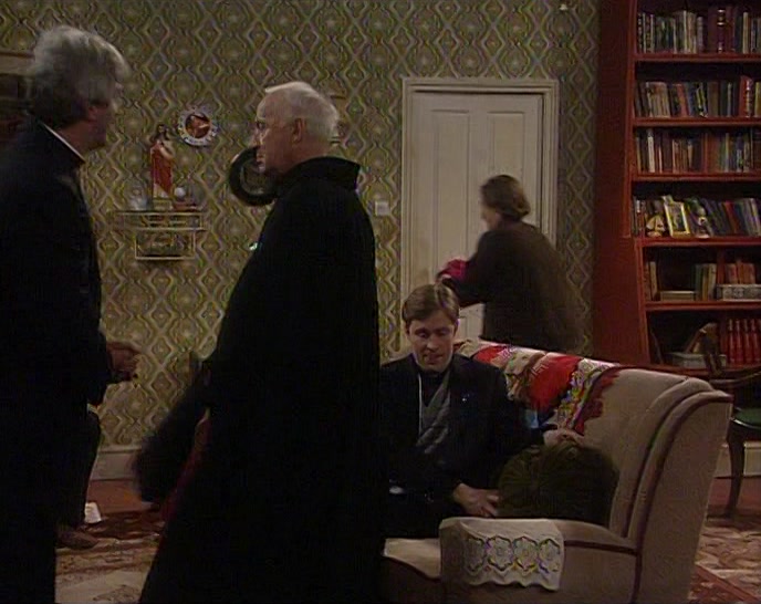 SIT DOWN THERE, YOUR GRACE, BESIDE FATHER DOUGAL. 