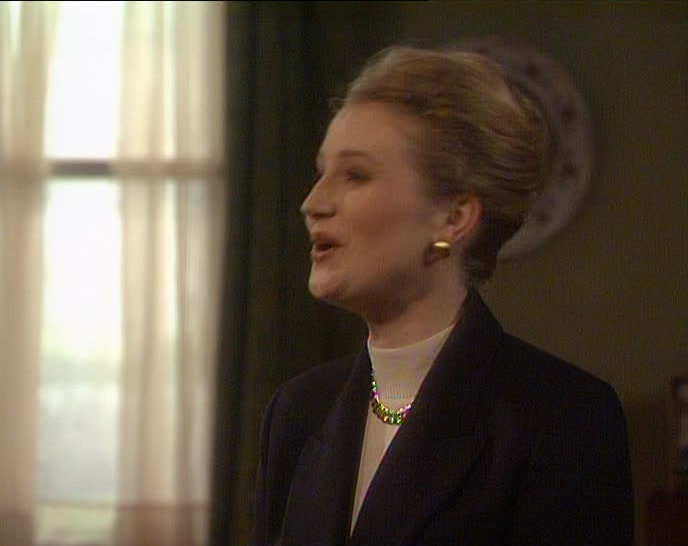 MY NAME IS LAURA SWEENEY. THIS MUST BE FATHER MCGUIRE. 