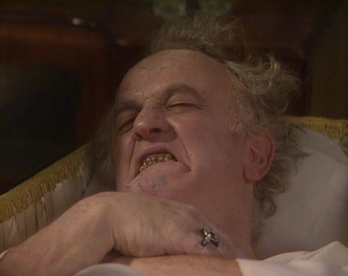 IT'S SAD, BUT LOOK AT HIM. HE LOOKS SERENE. 