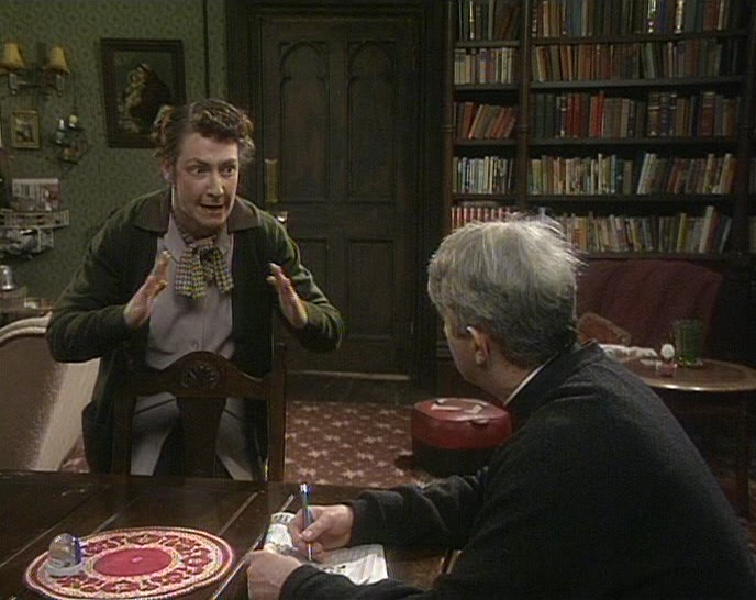 AND I'VE ARRANGED THE FERRERO ROCHER IN A BIG TRIANGULAR PILE. 