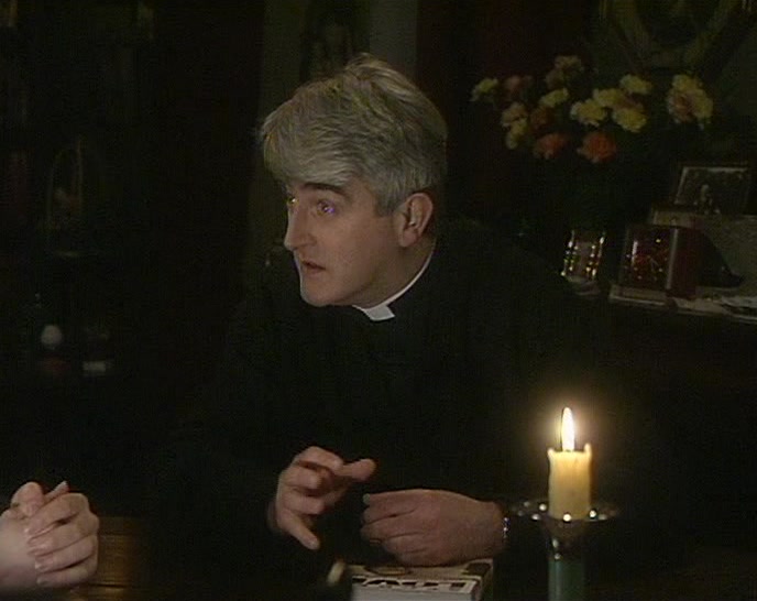 LIT BY A SINGLE CANDLE.  
