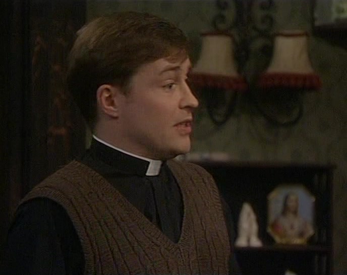 FATHER DAMIEN GAVE ME THE CIGARETTES TO MIND. 