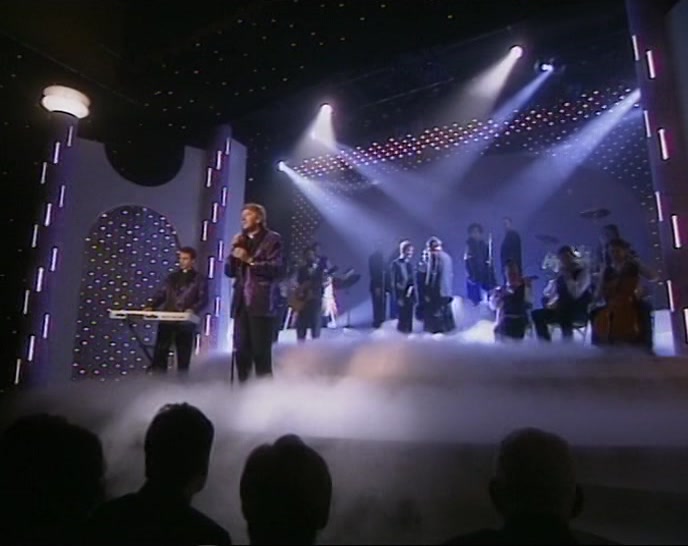 (CHOIR JOINS IN)  