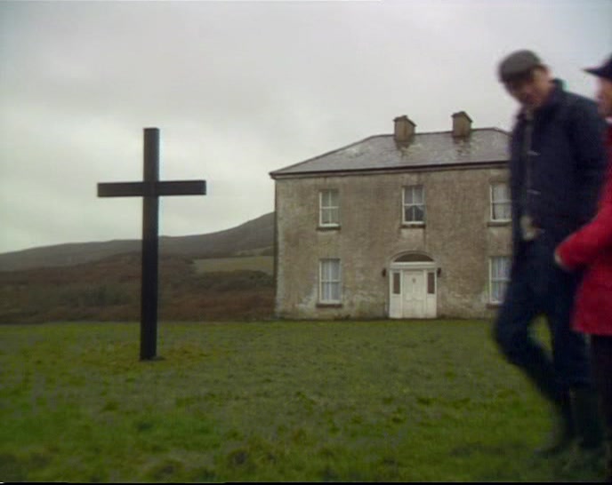 SOME MADMAN'S PUT UP A CROSS.  