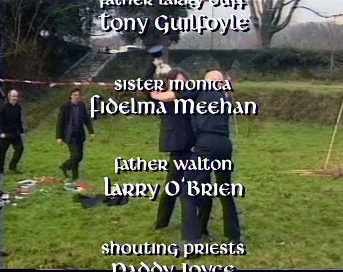 (MAN ON LOUDHAILER) 'FATHERS, PLEASE. CALM DOWN. 