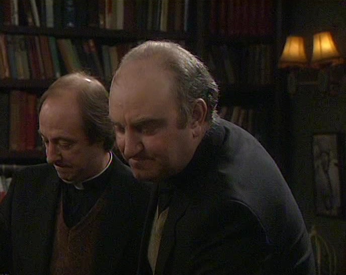 HMM... OH, YES. FATHER TOM COOGAN. WASN'T HE IN AFRICA? 