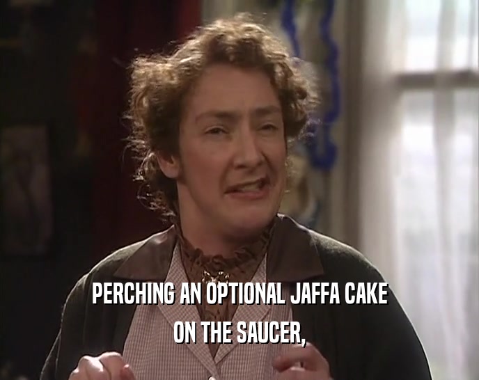 PERCHING AN OPTIONAL JAFFA CAKE ON THE SAUCER, 