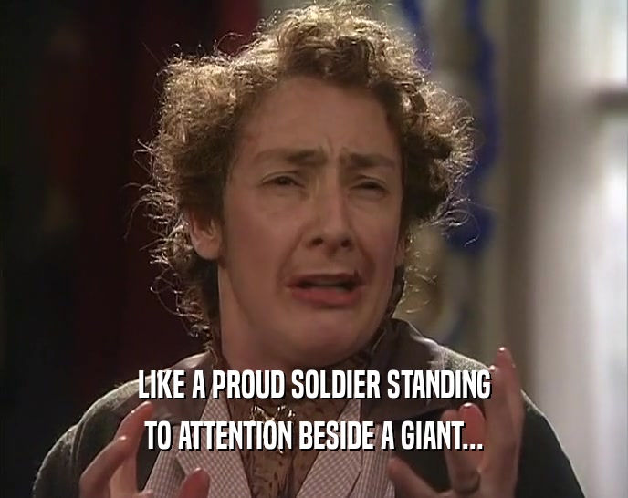 LIKE A PROUD SOLDIER STANDING TO ATTENTION BESIDE A GIANT... 