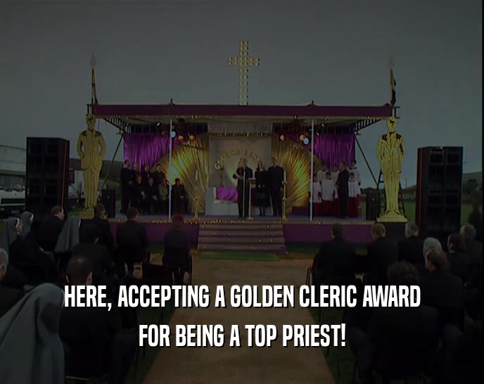 HERE, ACCEPTING A GOLDEN CLERIC AWARD
 FOR BEING A TOP PRIEST!
 