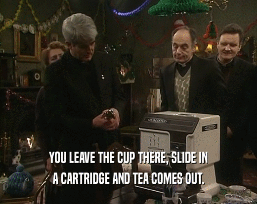YOU LEAVE THE CUP THERE, SLIDE IN
 A CARTRIDGE AND TEA COMES OUT.
 