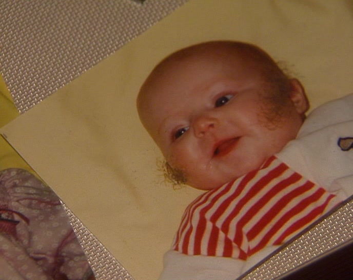 THIS BABY'S HEAD HAIR AND THIS BABY'S SIDEBOARDS... 