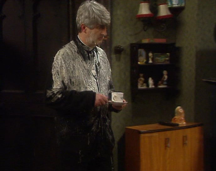 RIGHT, TED. LOOKS LIKE AN ORDINARY BLACKBOARD, DOESN'T IT? 