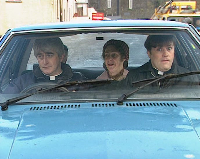 THERE'S MRS DINEEN, FATHER. YOU CAN DROP ME OFF HERE. 