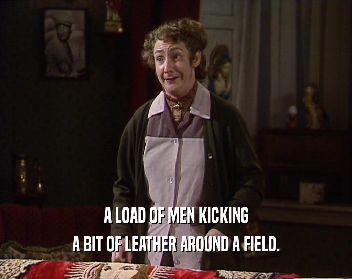 A LOAD OF MEN KICKING A BIT OF LEATHER AROUND A FIELD. 