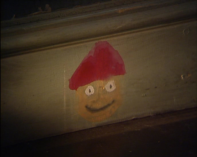 THERE SEEMS TO BE...A VERY CRUDE WATER COLOUR PAINTING... 