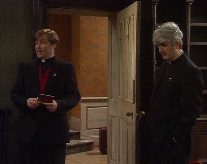 LOOK AT FATHER JACK. HE'S SO EXCITED HE CAN BARELY KEEP STILL. 