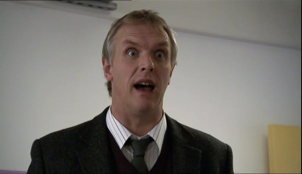 SIR! LOOK AT HIS BLAZER FOR STARTERS!  
