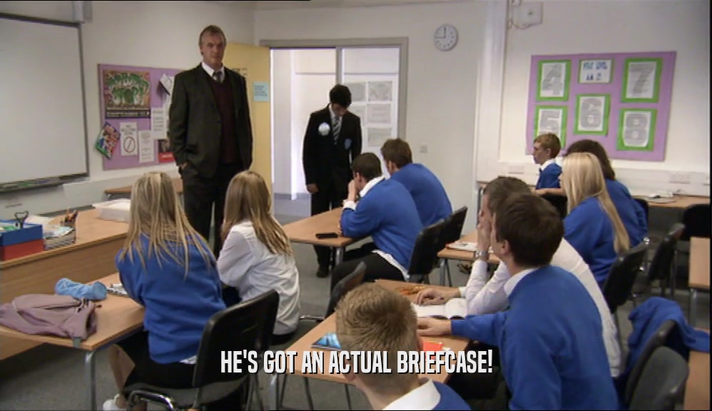 HE'S GOT AN ACTUAL BRIEFCASE!  
