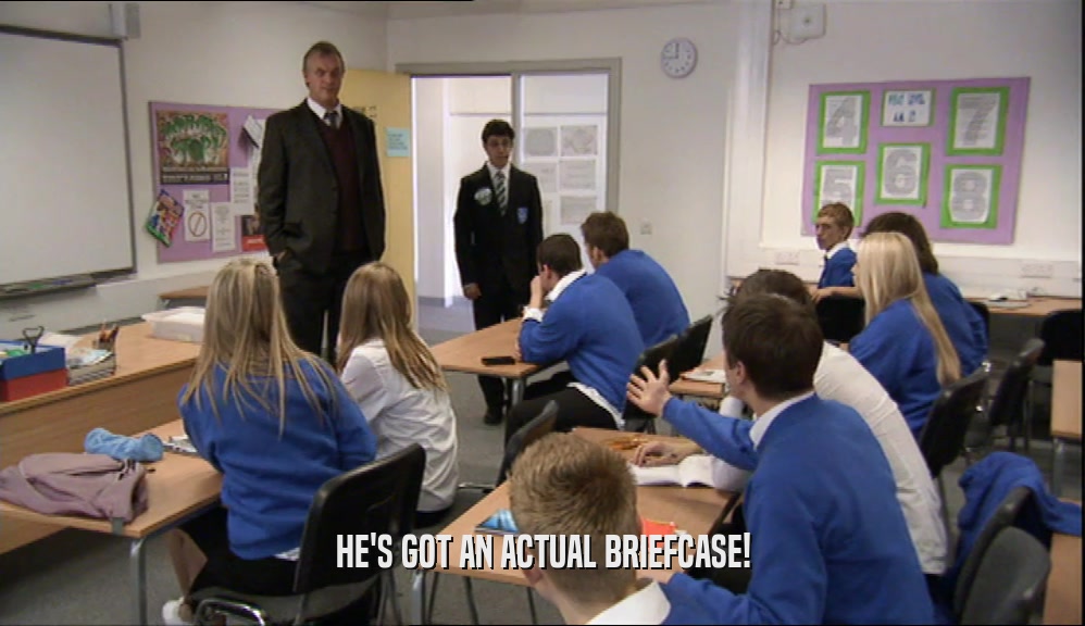 HE'S GOT AN ACTUAL BRIEFCASE!  