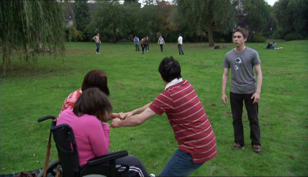 THOSE WANKERS ARE NICKING THAT GIRL'S FRISBEE. 