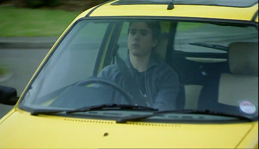 THE NOT-SO-GOOD NEWS WAS BRIGHT YELLOW AND PARKED IN MY DRIVEWAY. 