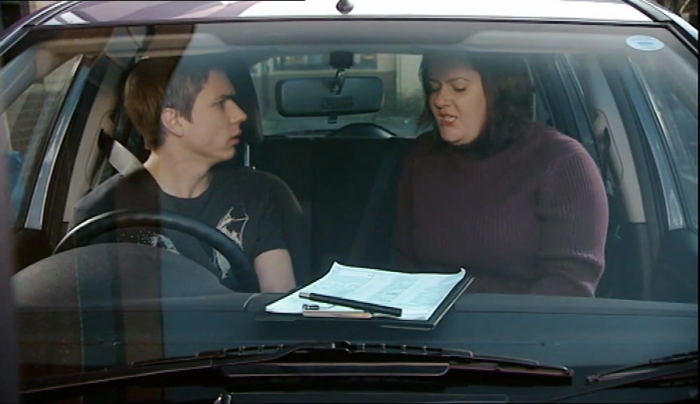 RIGHT, JUST SLIP IT INTO FIRST AND PULL OUT OF THE CENTRE SLOWLY. 
