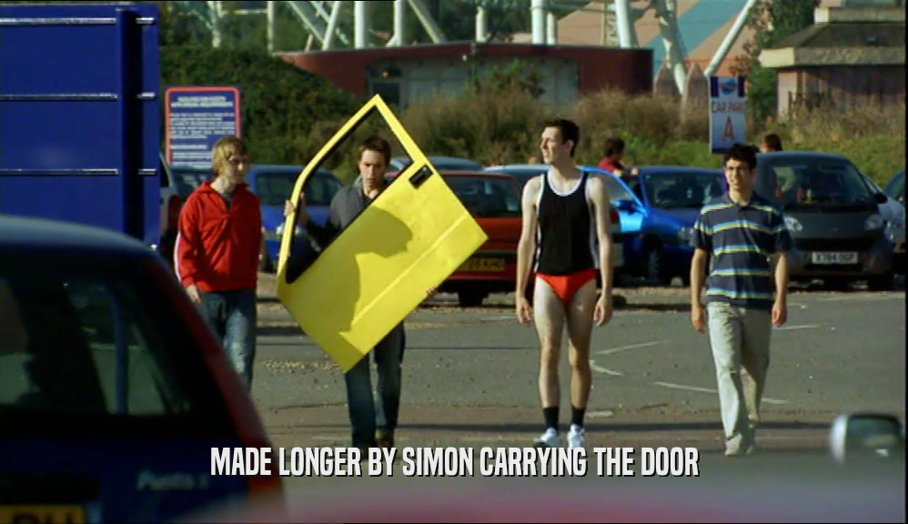 MADE LONGER BY SIMON CARRYING THE DOOR  