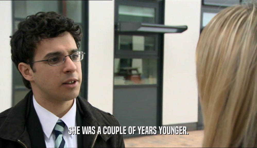 SHE WAS A COUPLE OF YEARS YOUNGER.  