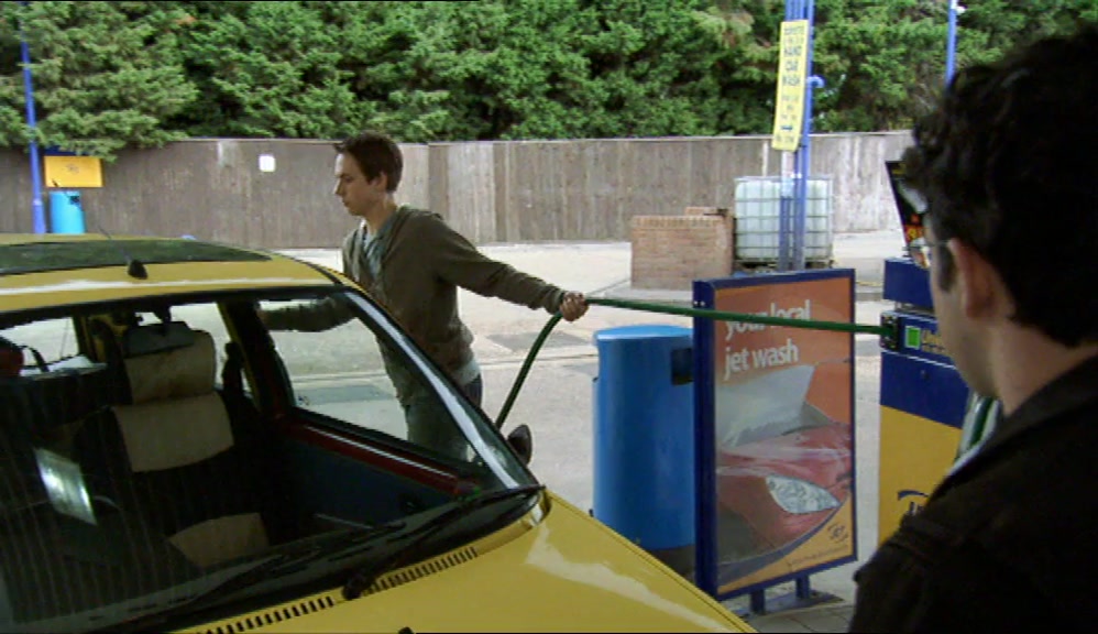 AND THOUGH SIMON COULD JUST ABOUT DRIVE A CAR, 