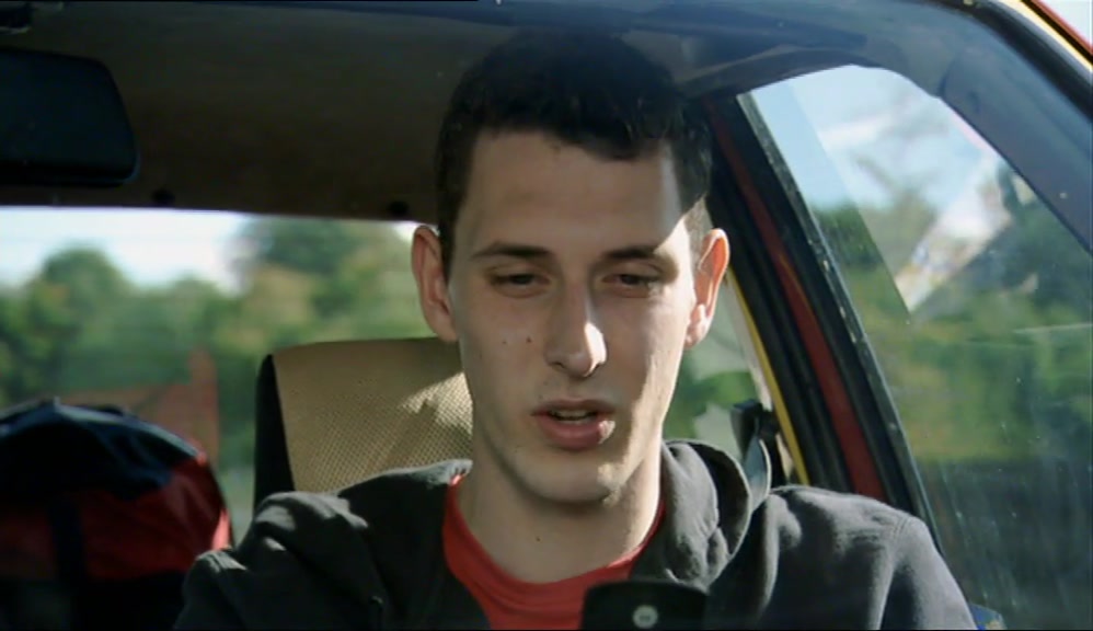 HE SAYS HE WANTS US TO PICK HIM UP AT THE GARAGE JUST OUTSIDE CAMBER SANDS 