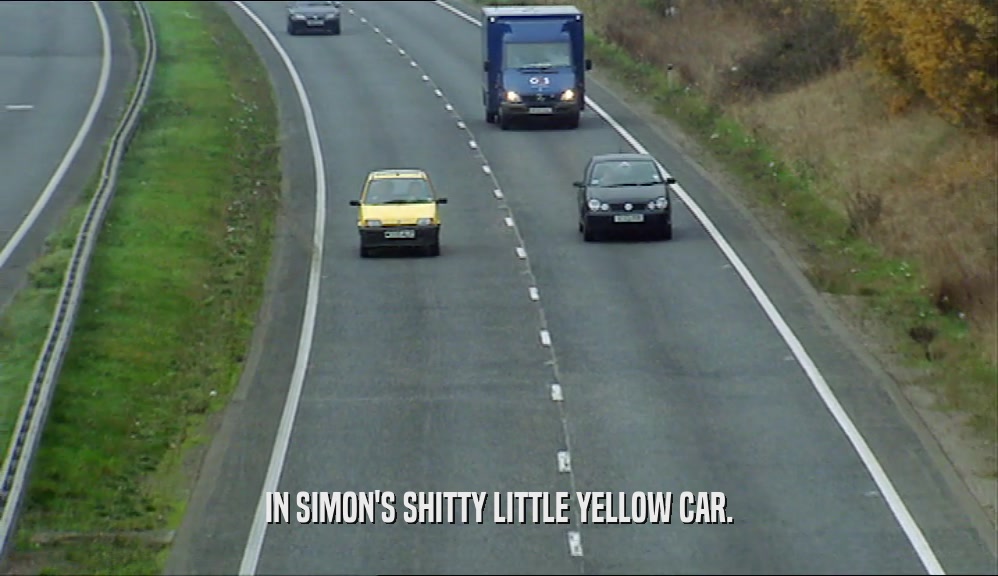 IN SIMON'S SHITTY LITTLE YELLOW CAR.  