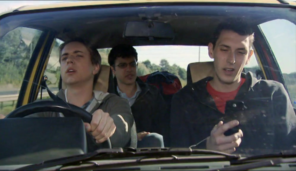 HE SAYS HE WANTS US TO PICK HIM UP AT THE GARAGE JUST OUTSIDE CAMBER SANDS 