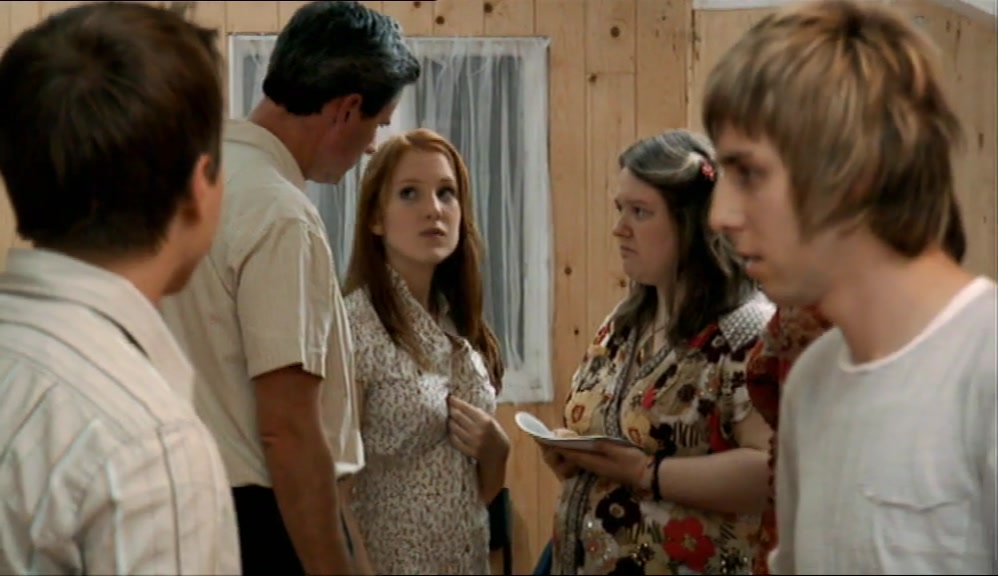 FUCK, SHE'S TALKING TO HER PARENTS. WE'D BETTER GO. 