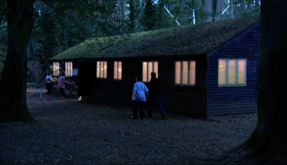 LAY JUST INSIDE A GIANT GARDEN SHED.  