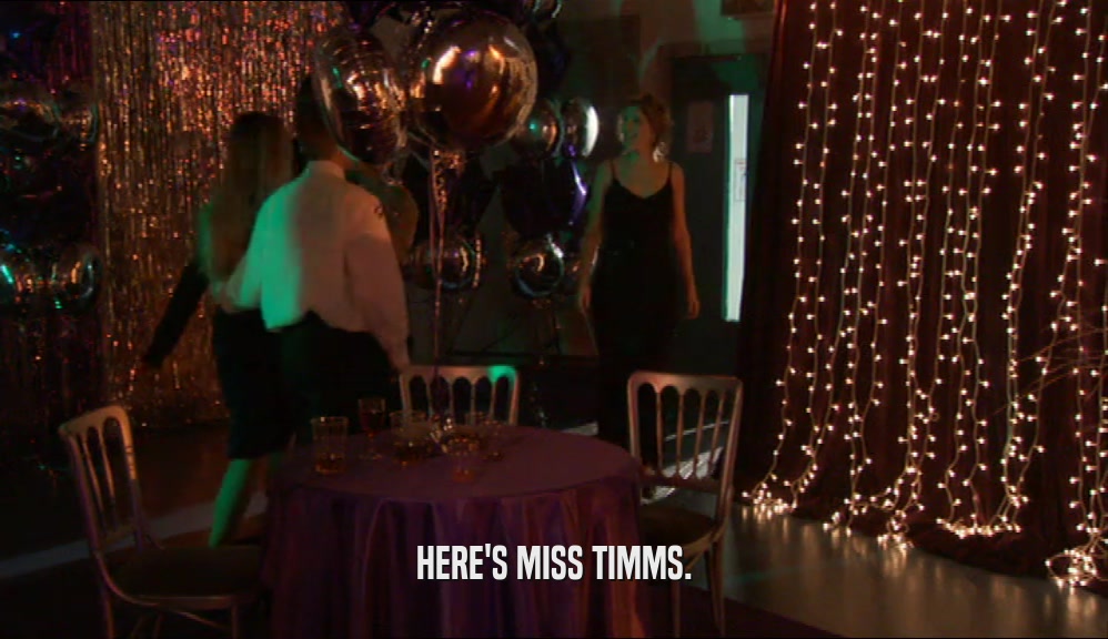 HERE'S MISS TIMMS.  