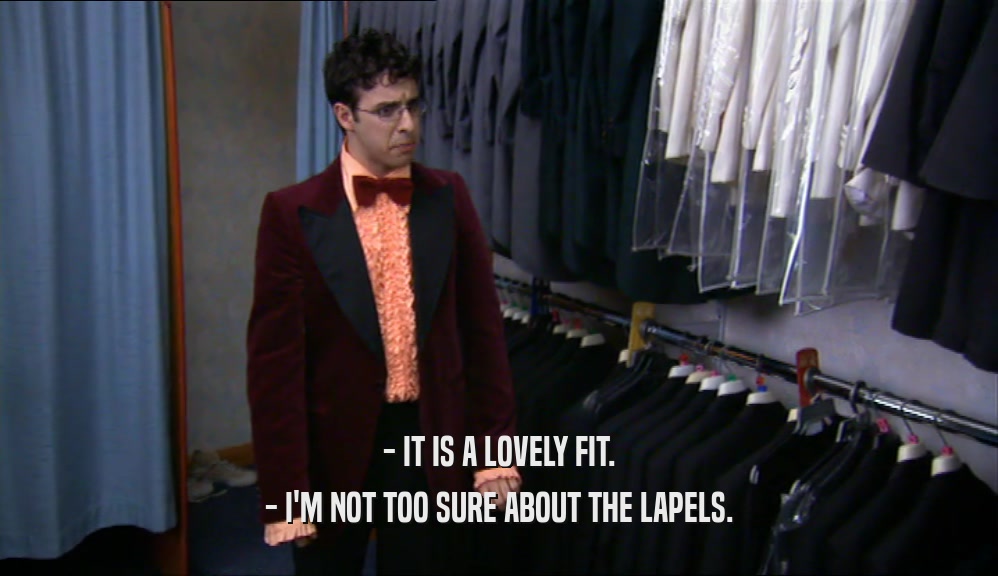 - IT IS A LOVELY FIT. - I'M NOT TOO SURE ABOUT THE LAPELS. 
