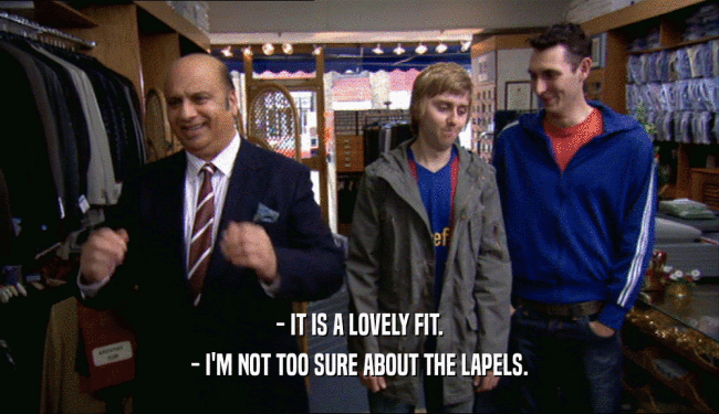 - IT IS A LOVELY FIT. - I'M NOT TOO SURE ABOUT THE LAPELS. 