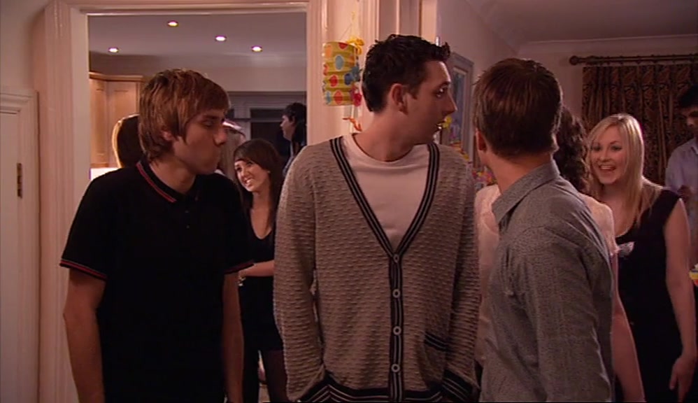 BY STANDING IN A CORRIDOR, NOT TALKING TO ANYONE. 