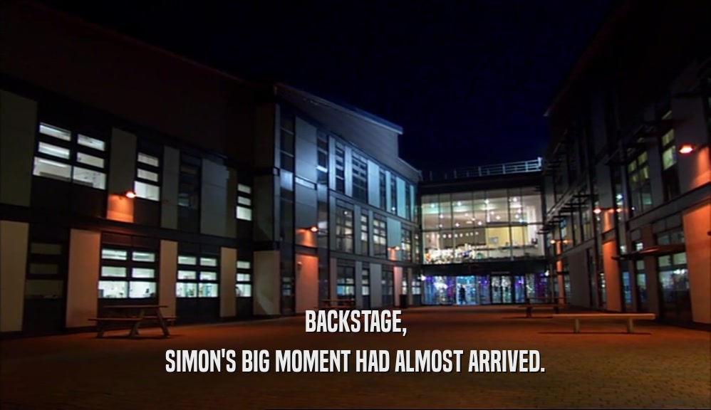 BACKSTAGE, SIMON'S BIG MOMENT HAD ALMOST ARRIVED. 