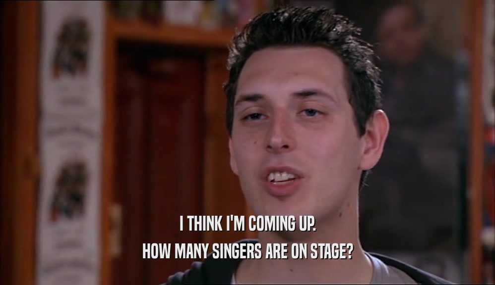 I THINK I'M COMING UP. HOW MANY SINGERS ARE ON STAGE? 