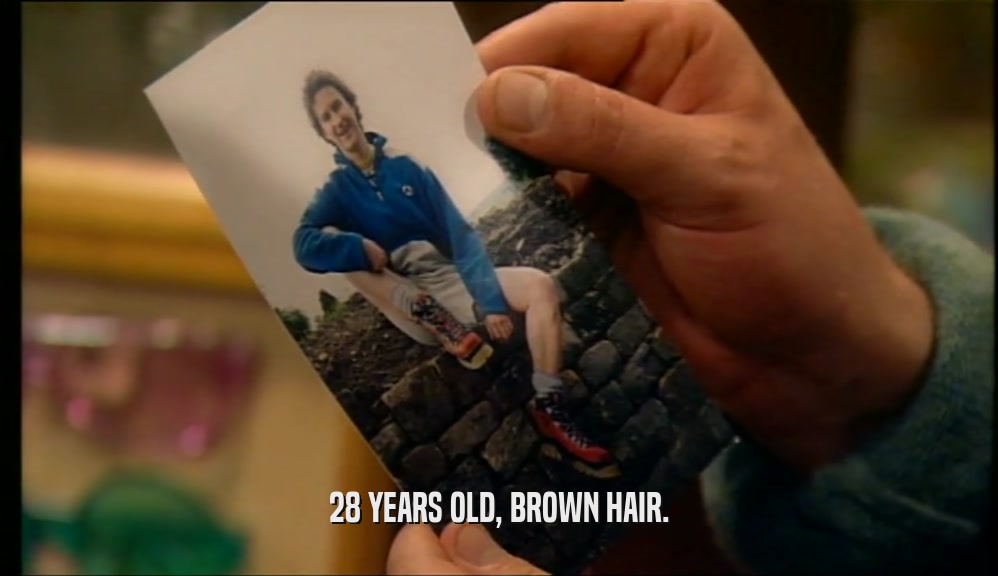 28 YEARS OLD, BROWN HAIR.  