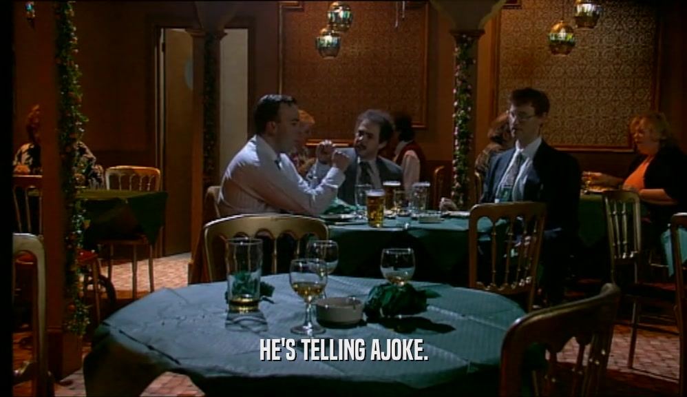 HE'S TELLING AJOKE.  