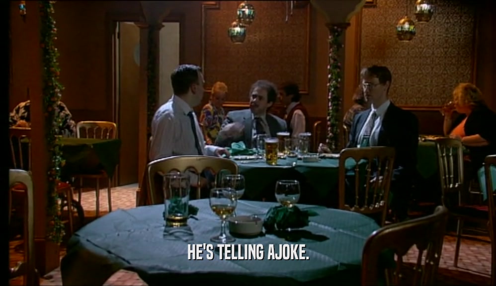 HE'S TELLING AJOKE.  
