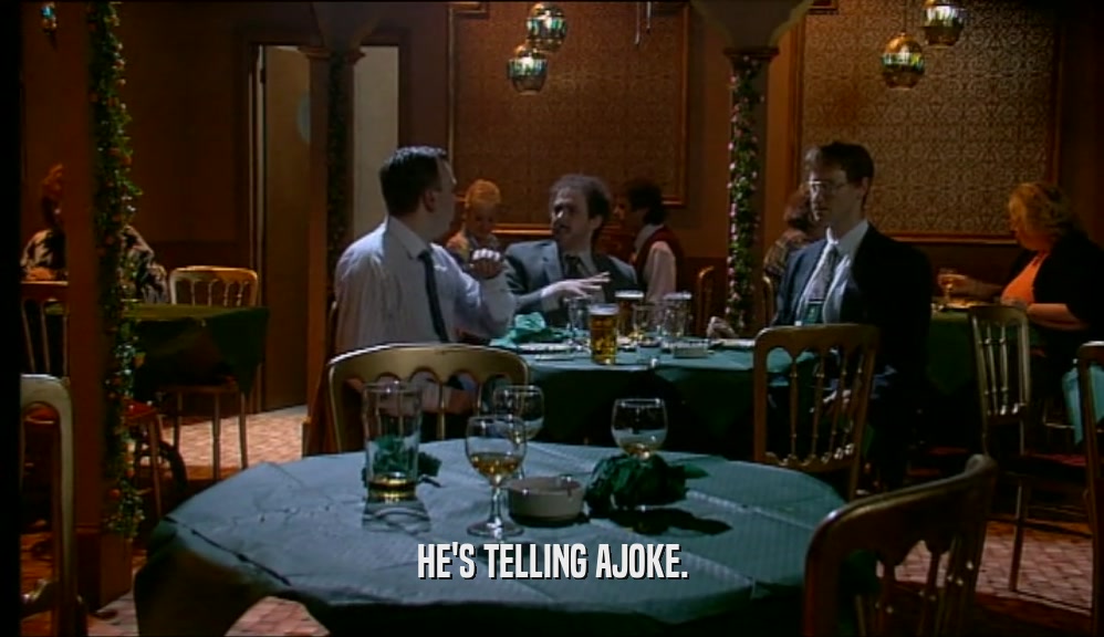 HE'S TELLING AJOKE.  