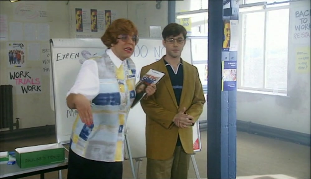 THAT WE'RE STANDING ON A BUSY HIGH STREET.  